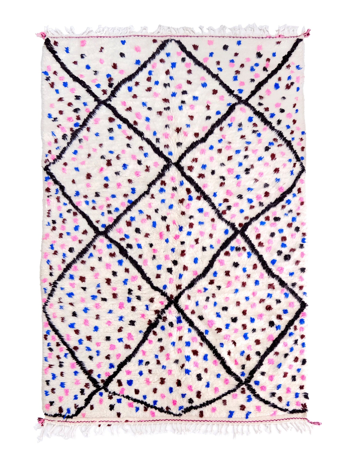 A cream-colored handwoven Moroccan shag rug featuring a large black diamond trellis pattern filled with scattered colorful dots in pink, blue, and maroon, finished with white fringe on the top and bottom edges.

