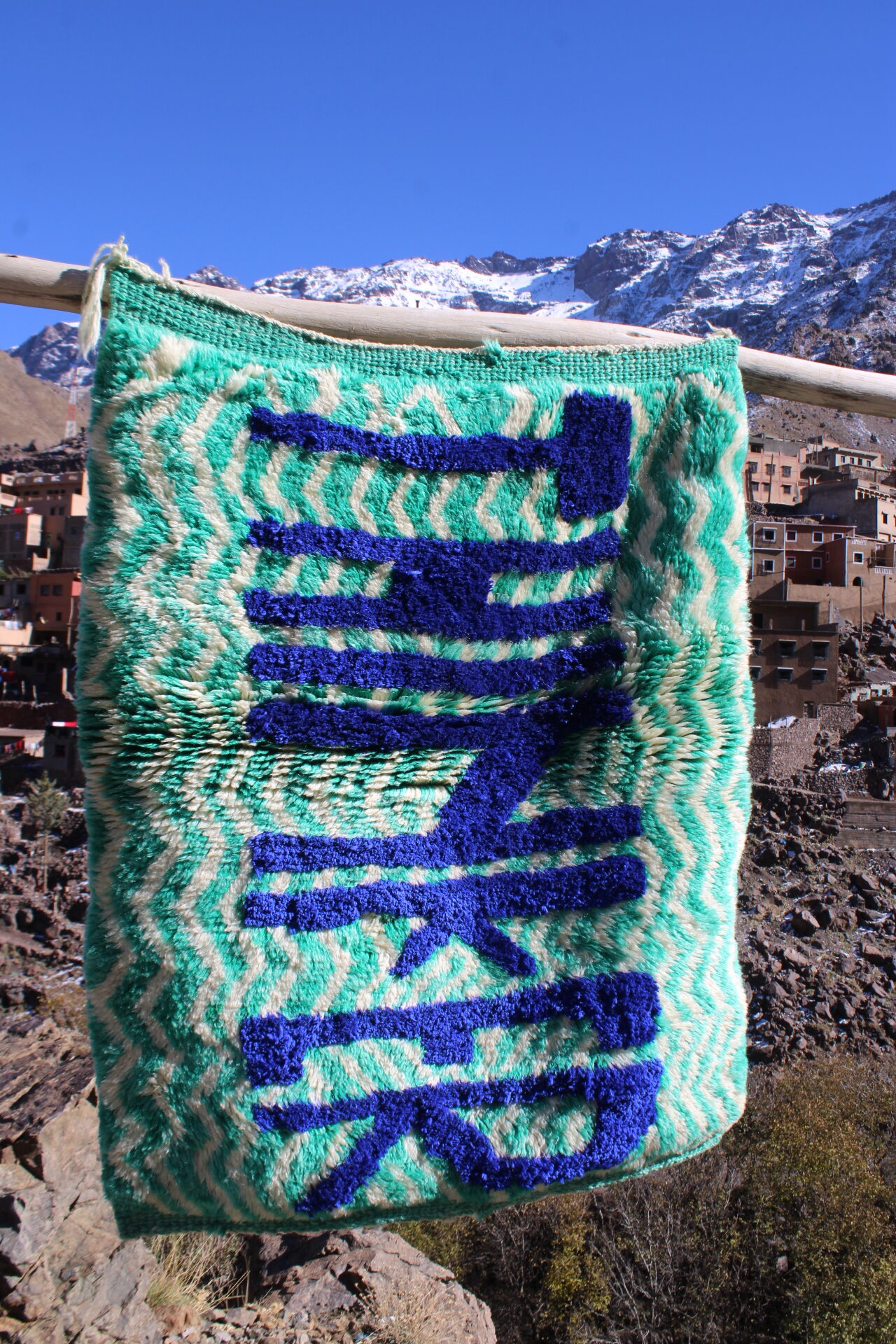 moroccan rug, beni imlil rug, handmade berber rug, atlas mountains rug, moroccan wall art, boho rug, green rug, blue rug, zig zag rug, statement rug, artisanal rug, small moroccan rug, handmade home decor, berber craft, imlil cooperative rug, wool rug, moroccan entryway rug, mini area rug, unique moroccan rug, thank rug