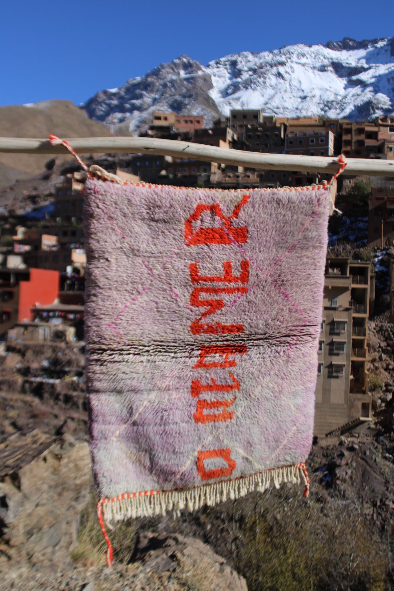 Moroccan rug, Berber rug, handwoven rug, handmade rug, wool rug, Moroccan decor, tribal rug, boho rug, bohemian decor, Atlas Mountains rug, pink rug, orange accents, small area rug, wall hanging rug, artisan rug, ethnic decor, unique rug, vintage style rug